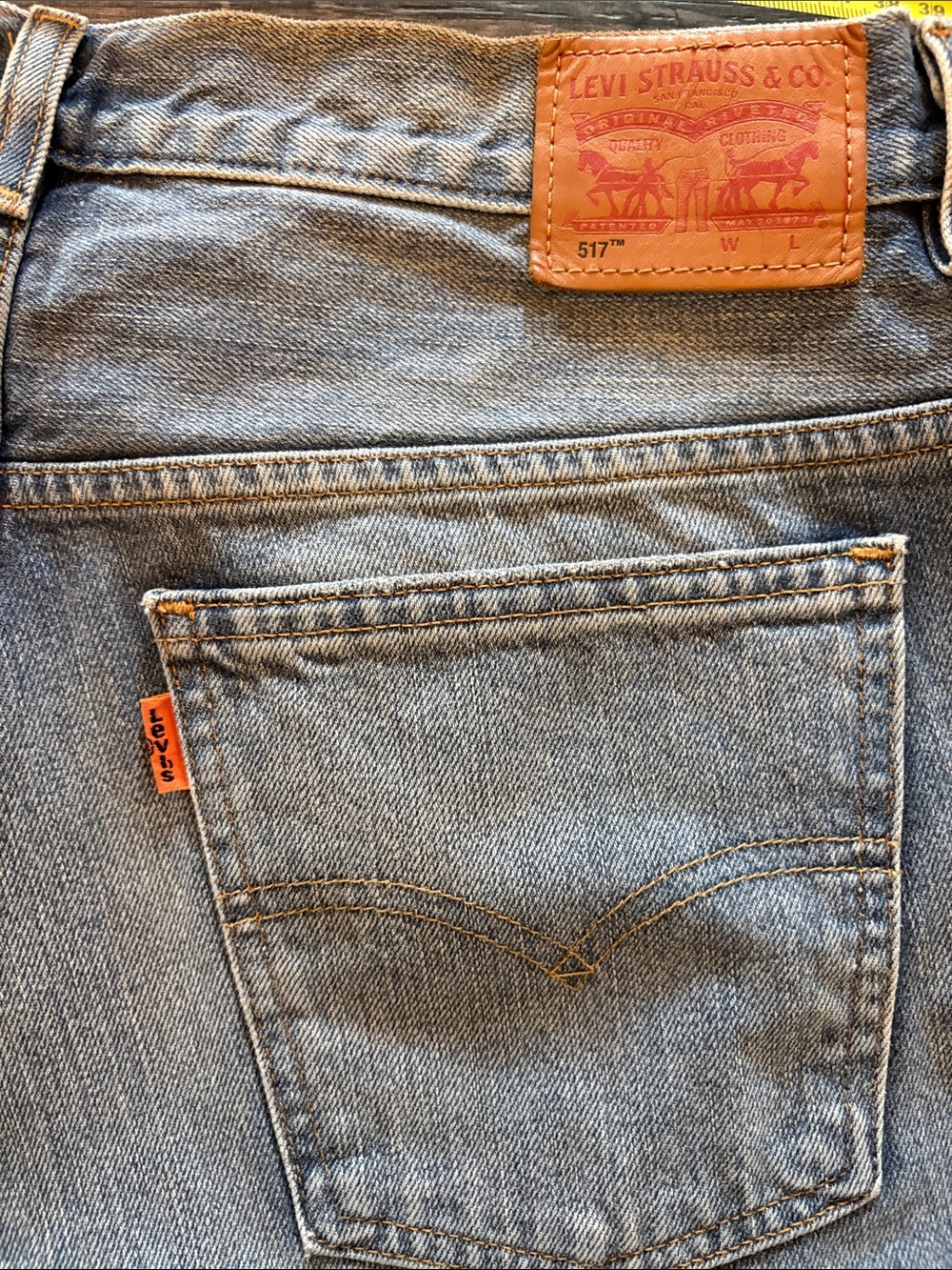 Orange tag Levi's 517 Light Blue Jeans with Tan Leather Patch